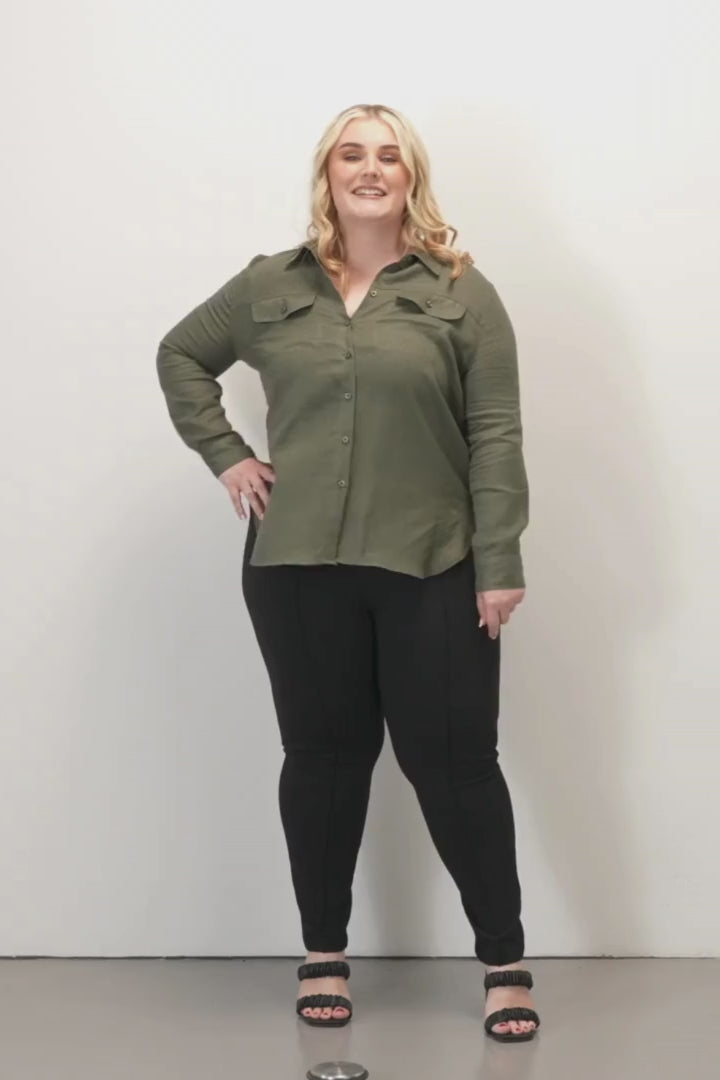 Shandell Long Sleeve Casual Shirt - Olive - Woman wearing a green button-up shirt against a white background